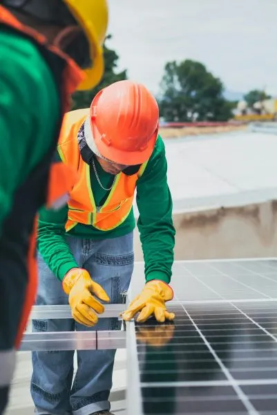 Tripower Australia technician installing solar power panels